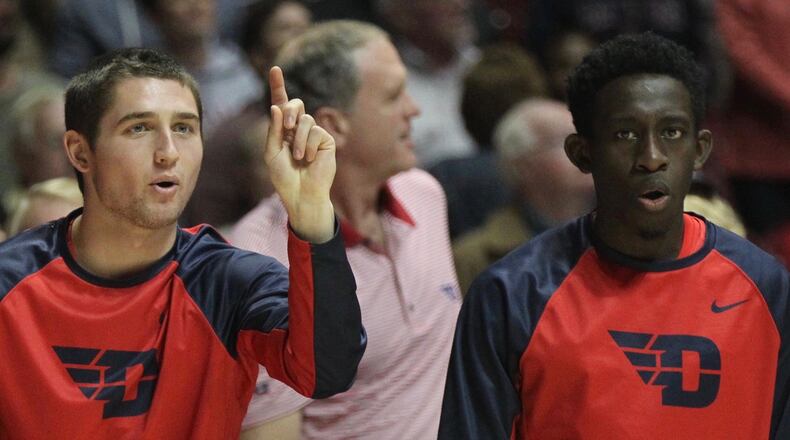 Dayton's Jack Westerfield, left, and Jeremiah Bonsu react to a play against Alabama on Tuesday, Nov. 15, 2016, at Coleman Coliseum in Tuscaloosa, Ala. David Jablonski/Staff