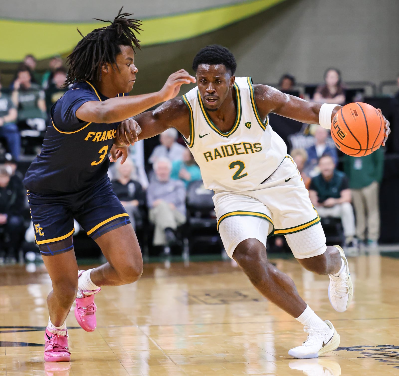 Wright State guard Sam Alamutu dribbles with pressure from Franklin College's Rohan Pearson during a season opener on Monday, Nov. 3 at Ervin J. Nutter Center in Fairborn. Alamutu scored nine points and had five rebounds and five steals. BRYANT BILLING/STAFF