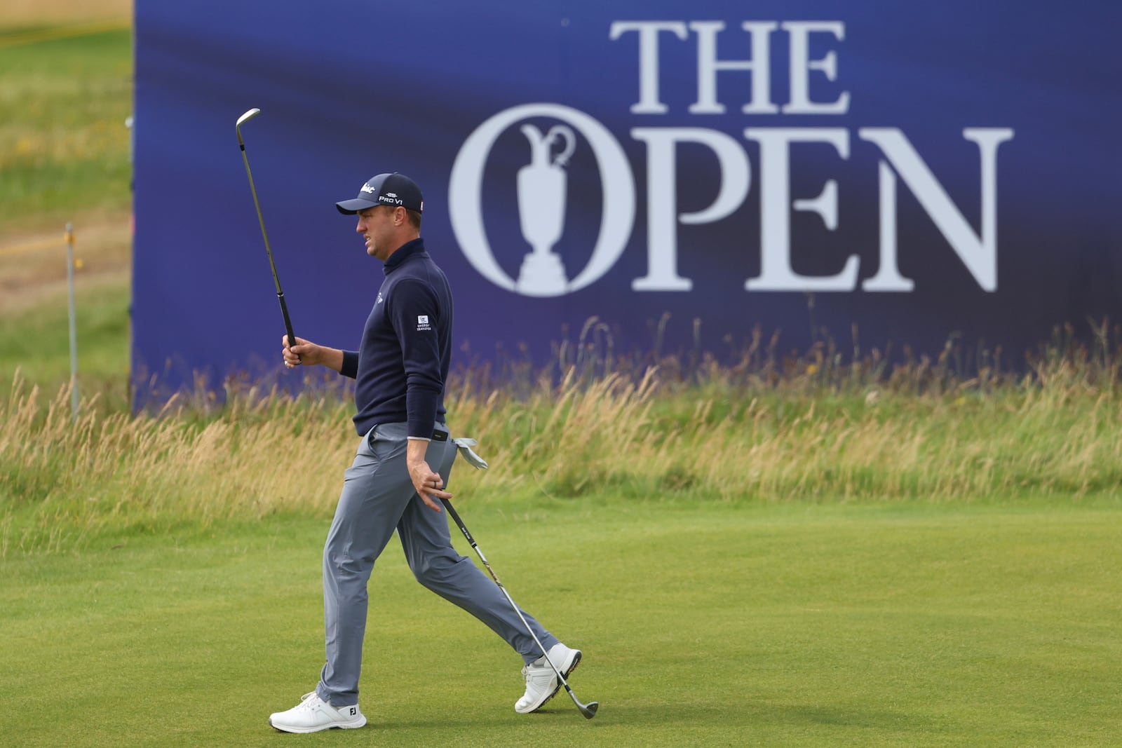 Justin Thomas of the United States walks off the 12th green during a practice round for the British Open golf championship at the Royal Portrush Golf Club, Northern Ireland, Tuesday, July 15, 2025. (AP Photo/Peter Morrison)