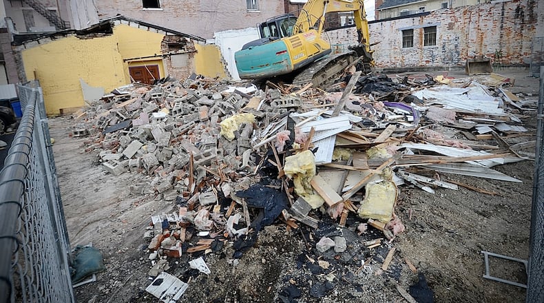 Demolition began early Wednesday March 29, 2023 on the Tavern building at 112-118 West Main Street in downtown Troy, but it was quickly stopped by city officials. The issue had been in court before that date and remains so today. MARSHALL GORBY\STAFF