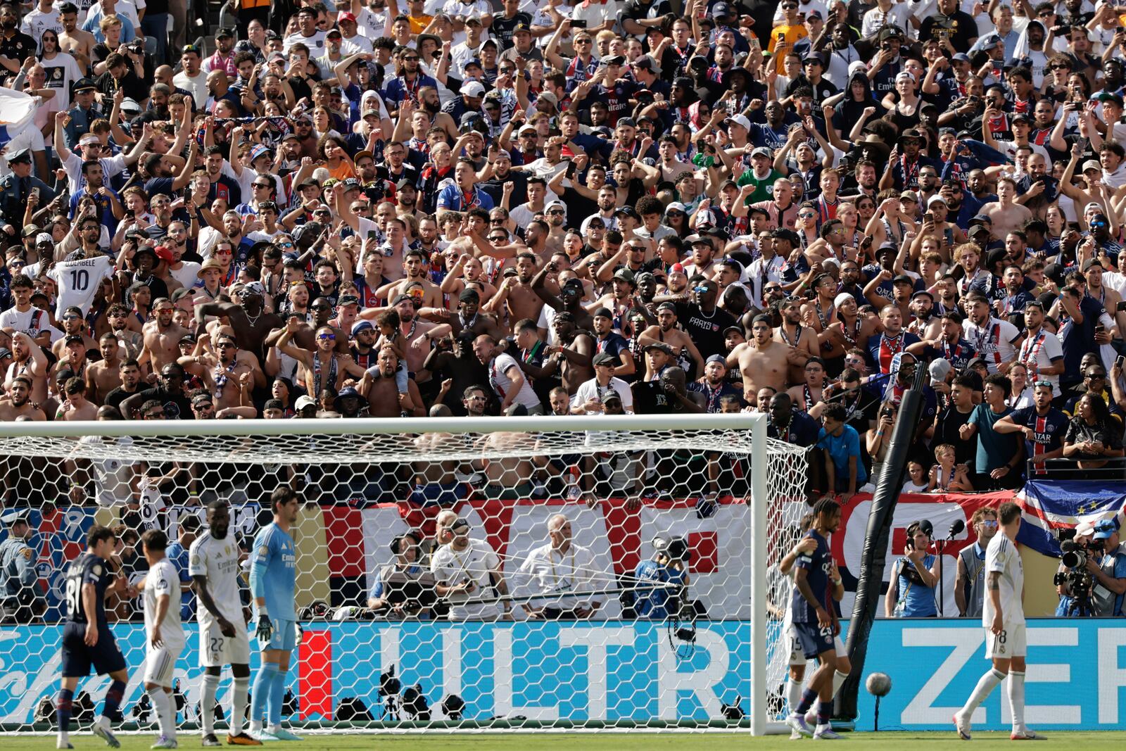 PSG fans cheer their team during the Club World Cup semifinal soccer match between PSG and Real Madrid in East Rutherford, N.J., Wednesday, July 9, 2025. (AP Photo/Adam Hunger)