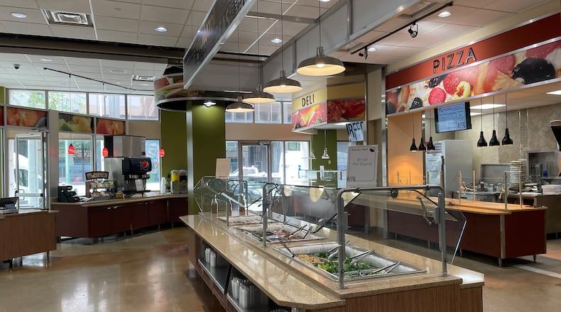 The RFFG Marketplace, located at 110 N. Main St. in downtown Dayton, features grab-and-go options, a salad bar, hot breakfast bar, grill station, pizza station and homestyle station. NATALIE JONES/STAFF