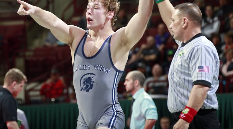 Stone Day of Valley View celebrates a win over Gage Braun of Graham at 195 lbs. in Division II during the final round of the OHSAA State Wrestling Tournament at Value City Arena in Columbus on Saturday, March 10, 2018. BarbPerenic/Dispatch