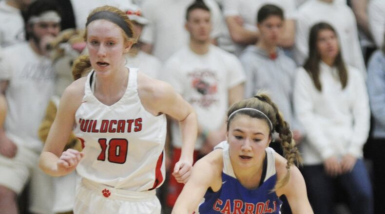 Ava Lickliter of Carroll (front) beats Jordan Rogers to the ball. Carroll defeated Franklin 57-43 in a girls high school basketball D-II regional final at Springfield High School on Friday, March 8, 2019. MARC PENDLETON / STAFF