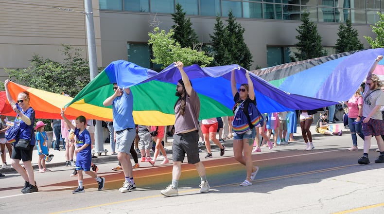 The Greater Dayton LGBT Center hosted the Dayton Pride Parade and Festival in downtown Dayton to celebrate the kickoff of Pride Month on Saturday, June 1, 2024. This year, the new parade route started on 2nd St., turned right on Main St. and 1st St. past the new festival area on Saint Clair St. and ended on Patterson Blvd. TOM GILLIAM/CONTRIBUTING PHOTOGRAPHER