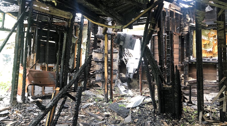 The inside of a fire-damaged home at 2030 E. Fourth St. CORNELIUS FROLIK / STAFF