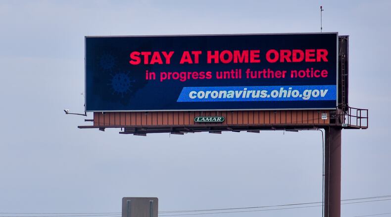 A billboard along Ohio 129 in Fairfield Township notifies drivers of the Stay At home Order in progress Tuesday, March 24, 2020. The governor put the order in place to slow the spread of coronavirus (COVID-10).