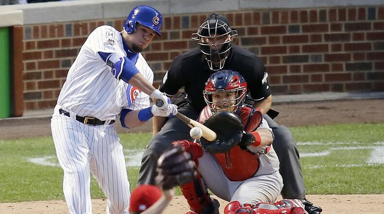 Middletown High School graduate Kyle Schwarber gets a fat pitch and turns it into a home run in the seventh inning of the Chicago Cubs’ series-clinching 6-4 win over the the St. Louis Cardinals on Tuesday. AP photo