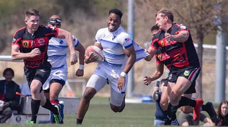 Air Force 1st Lt. Marquez Davis carries the ball during the Rugby Town 7 International Tournament on Aug. 26, 2017. COURTESY PHOTO/1ST LT. MARQUEZ DAVIS