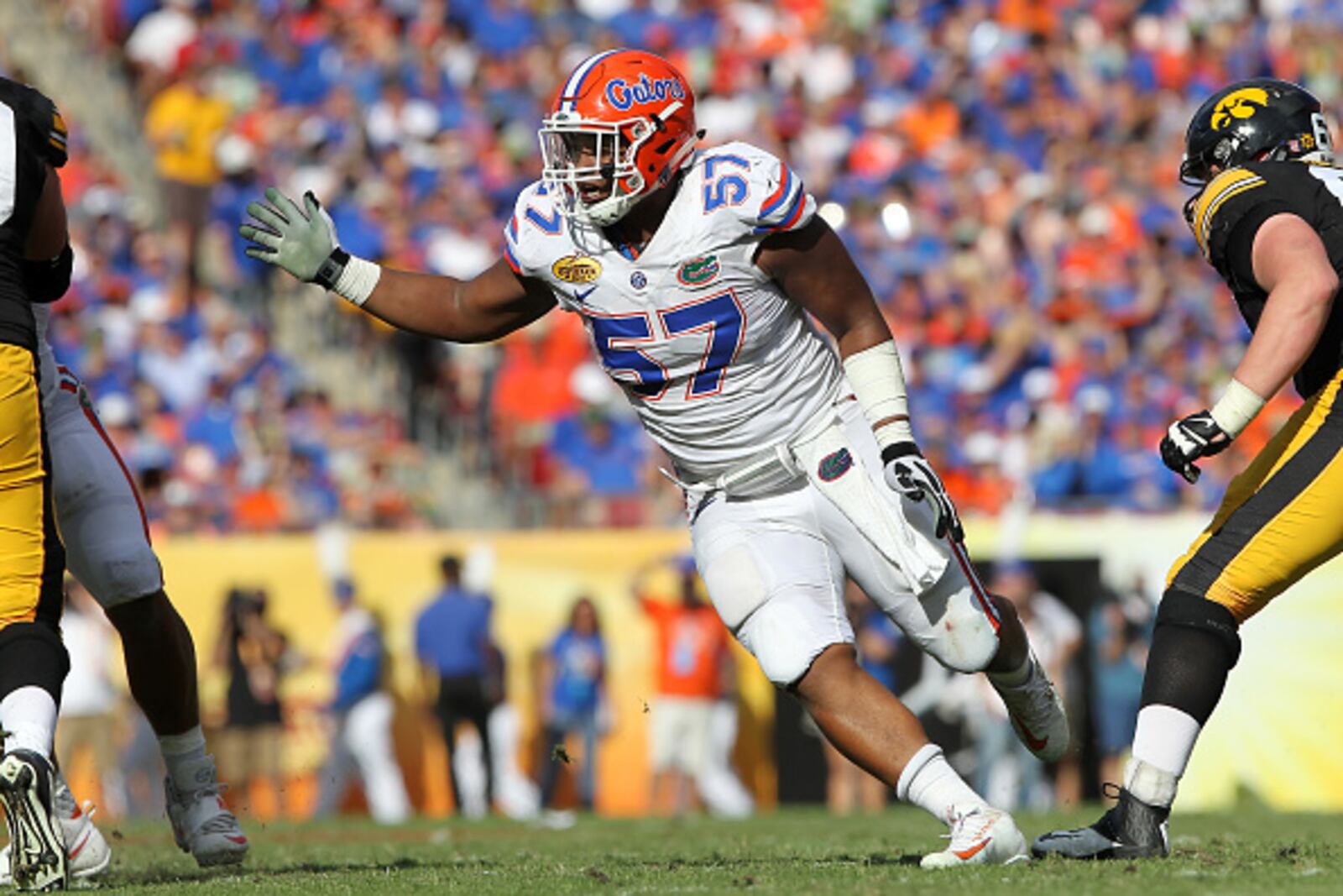 TAMPA, FL - JANUARY 02: Caleb Brantley of the Gators rushes the passer during the Outback Bowl game between the Florida Gators and the Iowa Hawkeyes on January 02, 2017, at Raymond James Stadium in Tampa, FL. (Photo by Cliff Welch/Icon Sportswire via Getty Images)