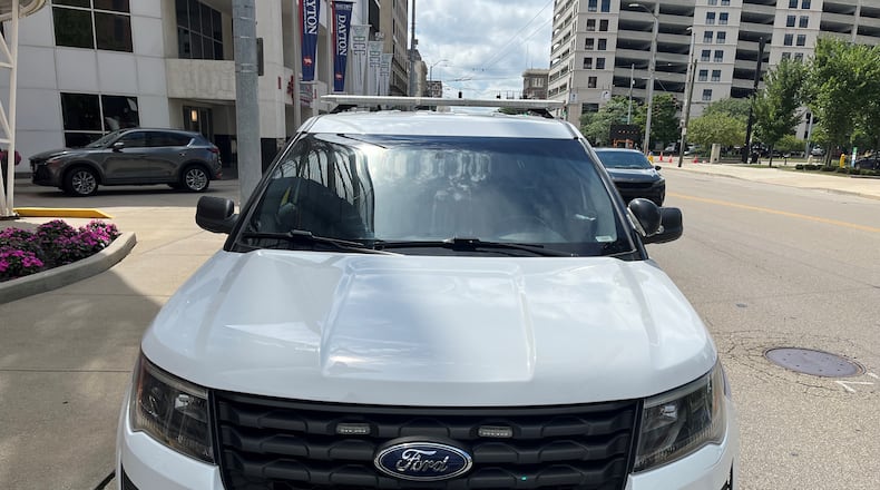 A Dayton Police Department cruiser in downtown Dayton. CORNELIUS FROLIK / STAFF