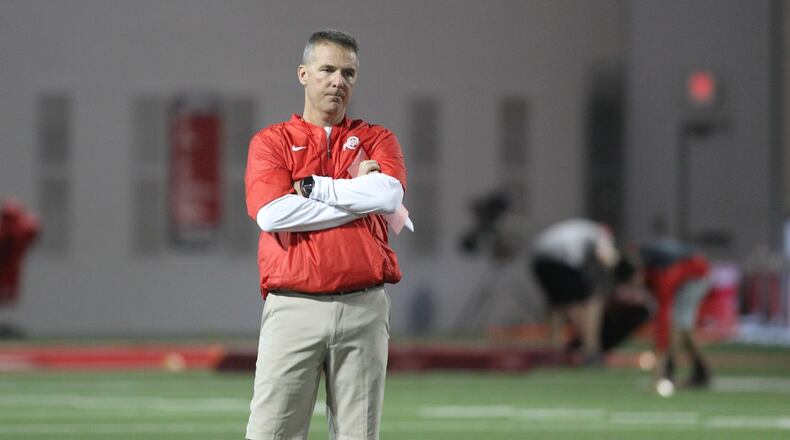 Ohio State coach Urban Meyer watches practice on Tuesday, March 7, 2017, at the Woody Hayes Athletic Center in Columbus. David Jablonski/Staff