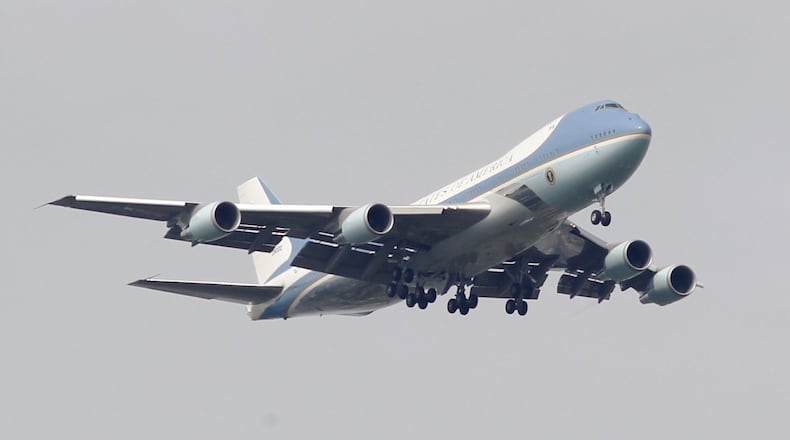 This Air Force VC-25 Presidential aircraft flies practice approaches into Wright-Patterson Air Force Base on Thursday, May 17. This aircraft is one of two VC-25s based on the Boeing 747 and is only referred to as Air Force One when the president is on board. One of the two jets routinely visit the base for practice approaches and flight procedures. A similar looking aircraft, the Air Force E-4B NAOC, is based on the Boeing 747 and stationed at Wright-Patterson. TY GREENLEES / STAFF