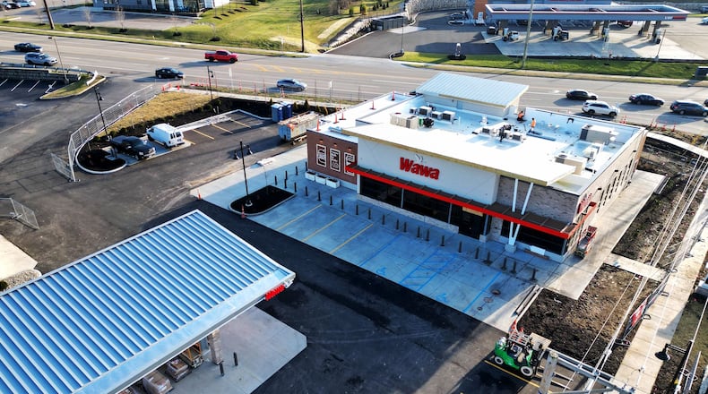 Construction continues Monday, Dec. 26, 2024 on a Wawa convenience store at the corner of Liberty Way and Cincinnati Dayton Road in Liberty Township. NICK GRAHAM/STAFF