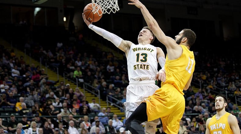 Wright State’s Grant Benzinger soars in for a layup vs. Valparaiso last season. TIM ZECHAR / CONTRIBUTED