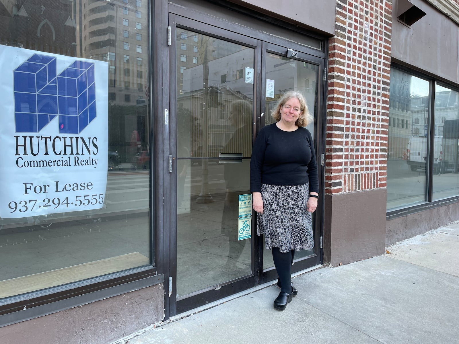 Larkin Vonalt, executive director of Dayton Book Fair, pictured outside Rabbit Hole Books, 27 W. First Street, in October 2022. Photo by Natalie Jones  
