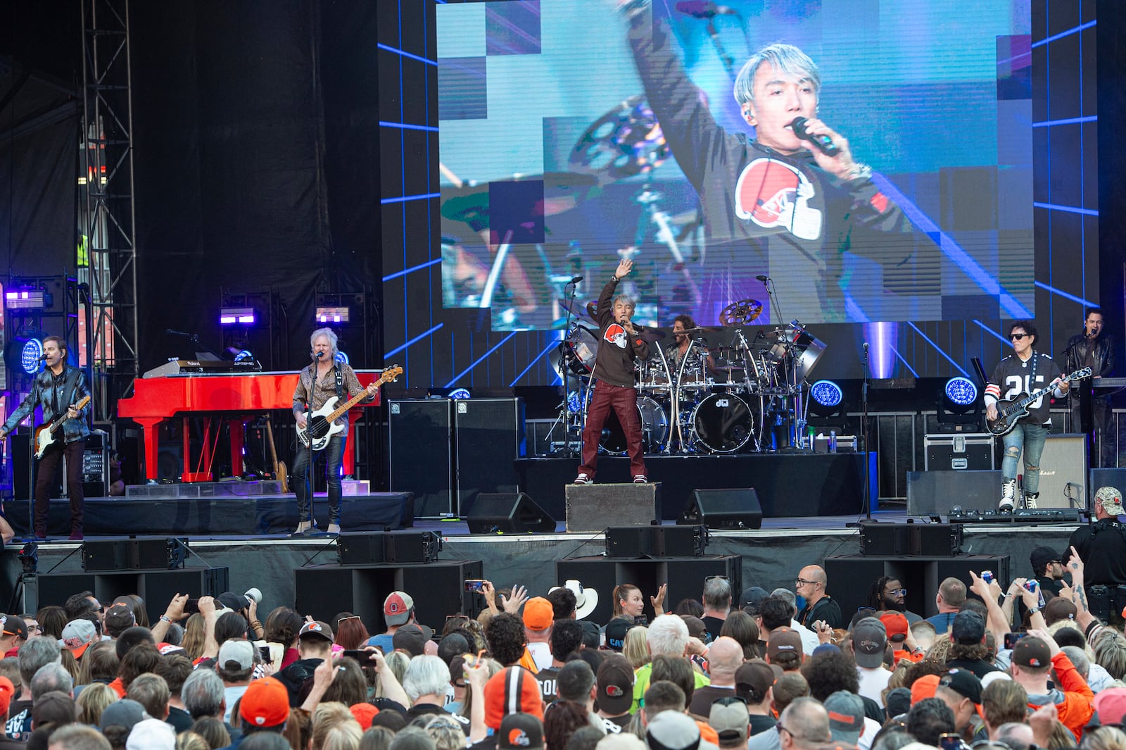 The rock band Journey performs at the Cleveland Browns NFL football draft party in Cleveland, Thursday, April 24, 2025. (AP Photo/Phil Long)