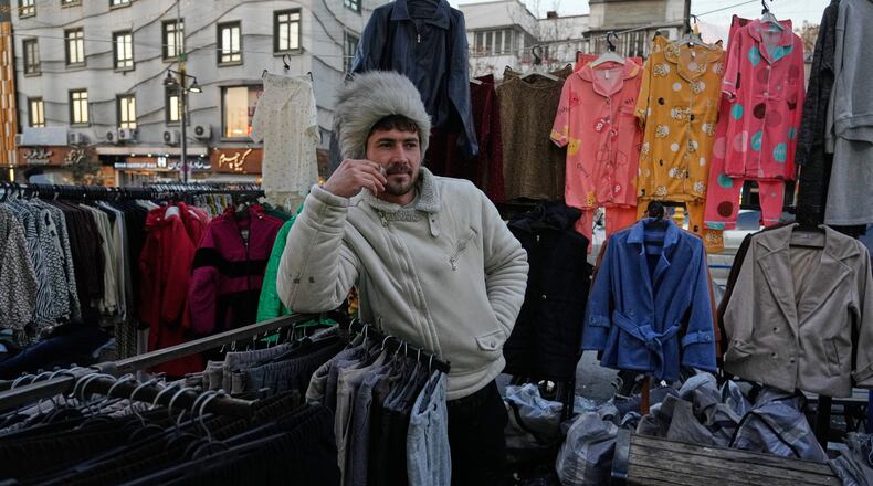 A vendor waits for customers at Tajrish Square in Tehran, Iran, Tuesday, Jan. 27, 2026. (AP Photo/Vahid Salemi)