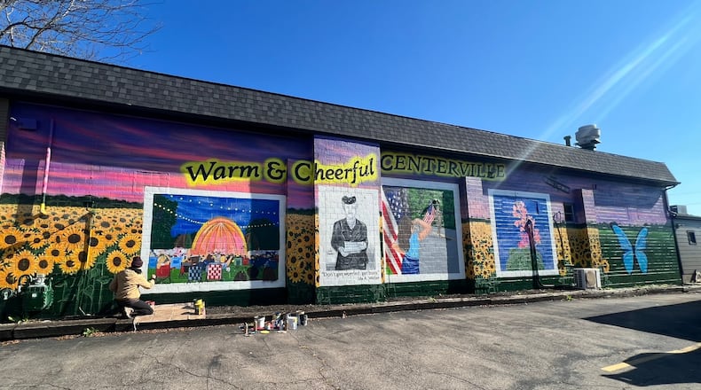 ‘Welcome to Centerville’ mural debuts on the west-facing wall of Uptown’s newest restaurant Meridien at 28 W. Franklin St.