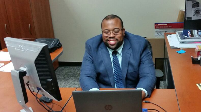 Lamarcus Penn researches Veterans Affairs benefit changes in his office Bldg. 2 in Area A. Penn works closely with the military services coordinators located in the VA/Department of Defense office at the Wright-Patterson Medical Center. (U.S. Air Force photo/W. Eugene Barnett)