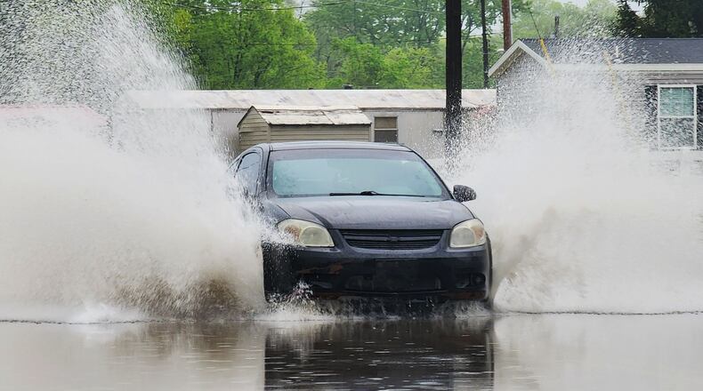 Heavy rainfall leads to high water on Carmody Boulevard in Middletown on May 7, 2023. Nick Graham / STAFF