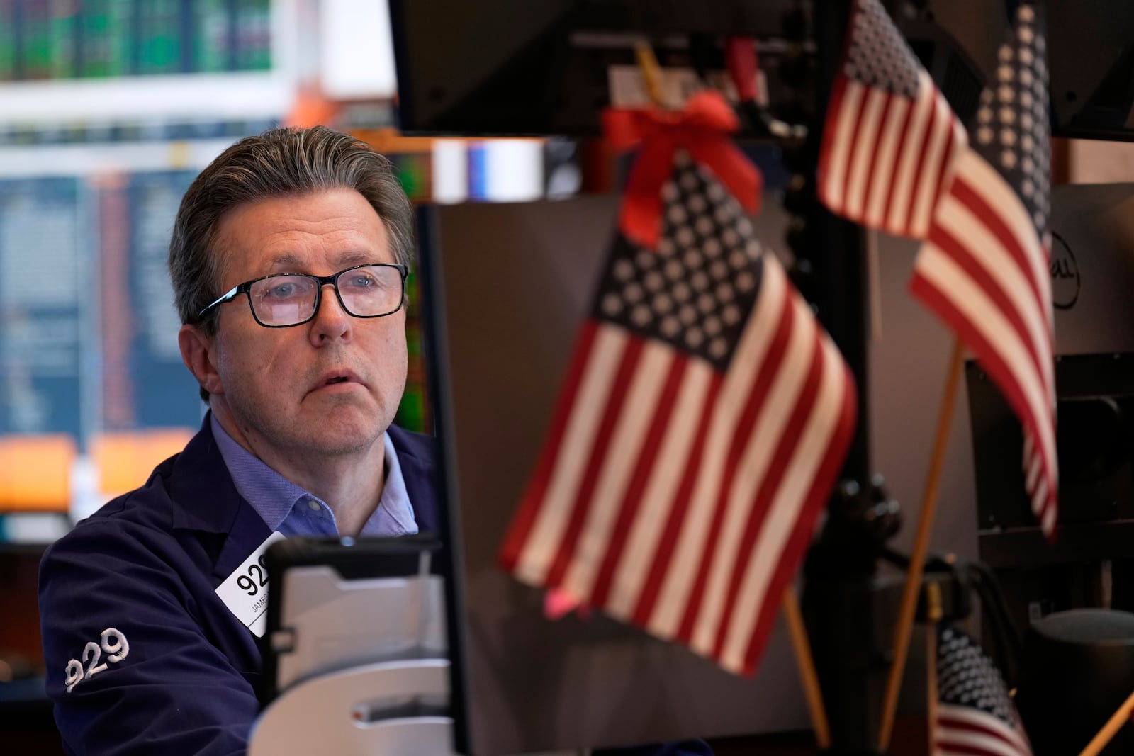 James Matthews works on the floor at the New York Stock Exchange in New York, Wednesday, July 16, 2025. (AP Photo/Seth Wenig)