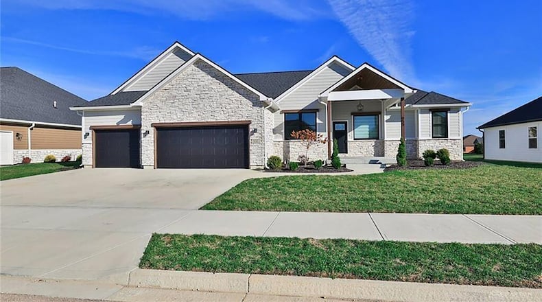 This five bedroom ranch was built in 2022 and features a main floor primary bedroom suite, open concept family room, dining room and kitchen and a split bedroom plan with two guest bedrooms on the opposite side. CONTRIBUTED