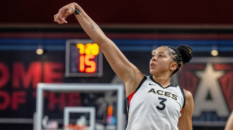 FILE - Las Vegas Aces center Candace Parker (3) watches her shot during a WNBA basketball game against the Atlanta Dream, Friday, June 2, 2023, in College Park, Ga. (AP Photo/Danny Karnik, File)