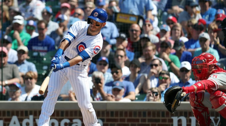 The Chicago Cubs' Tommy La Stella hits an RBI single in the fifth inning against the Philadelphia Phillies on Thursday, June 7, 2018, at Wrigley Field in Chicago. (Brian Cassella/Chicago Tribune/TNS)