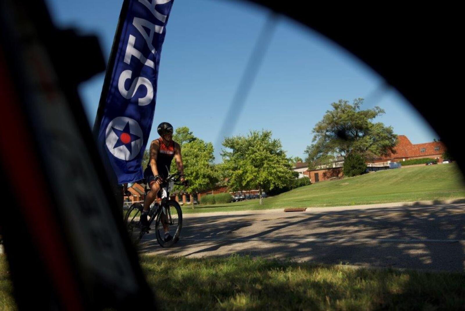 A competitor prepares to start the Blue Streak Time Trial race July 12 at Wright-Patterson Air Force Base. The biking event is held every month from April to October and open to all base personnel and family members. U.S. Air Force photo/Airman 1st Class James Johnson