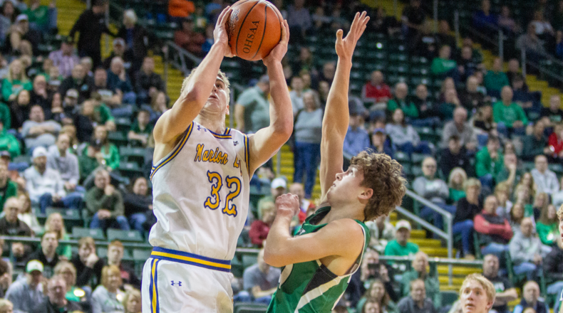 Marion Local's Brayden Mescher scores against Anna's Rhylan Platfoot during the second quarter of Saturday's Division VI regional final at the Nutter Center. Jeff Gilbert/CONTRIBUTED