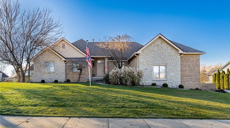 The ranch style home has a finished walk out basement and inground pool.