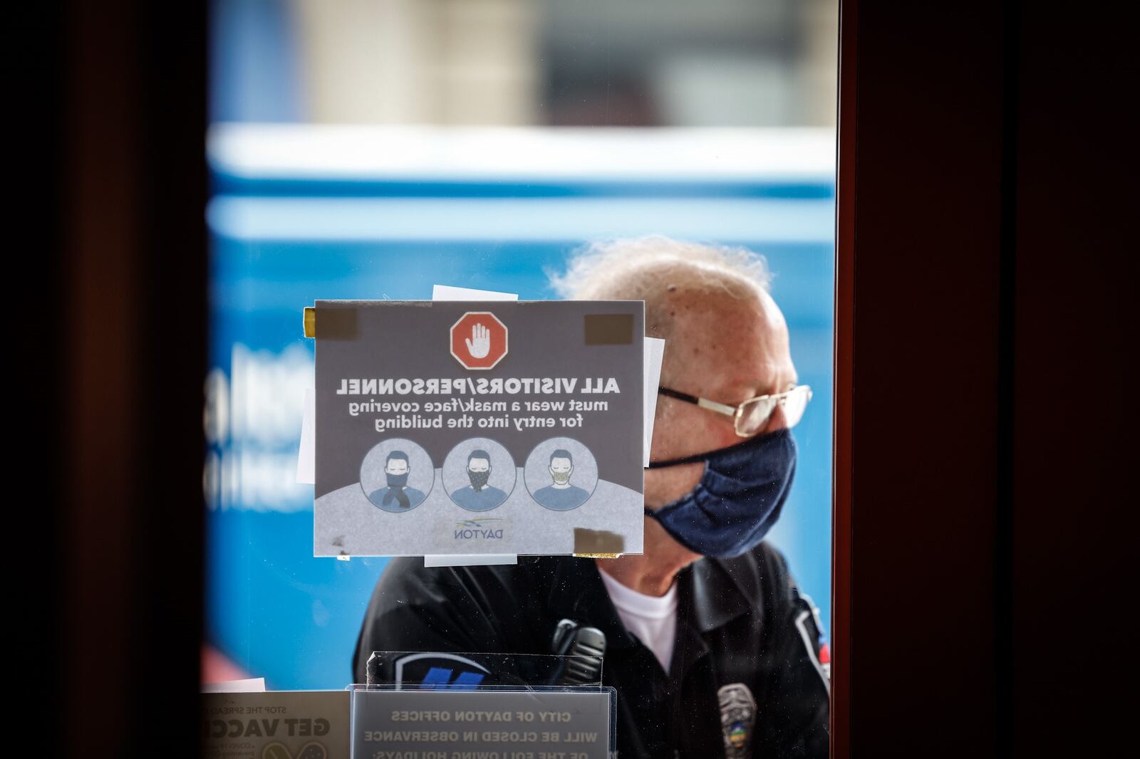 A security guard at Dayton City Hall. JIM NOELKER/STAFF