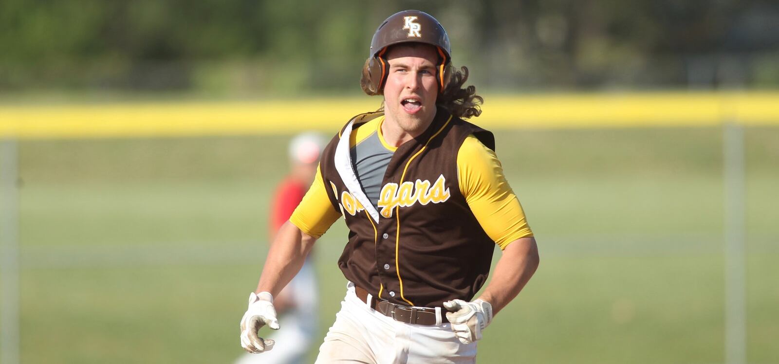 Kenton Ridge’s Luke Holt rounds the bases after a home run against Tippecanoe in a Division II sectional final at Tecumseh High School on Thursday, May 18, 2017. David Jablonski/Staff