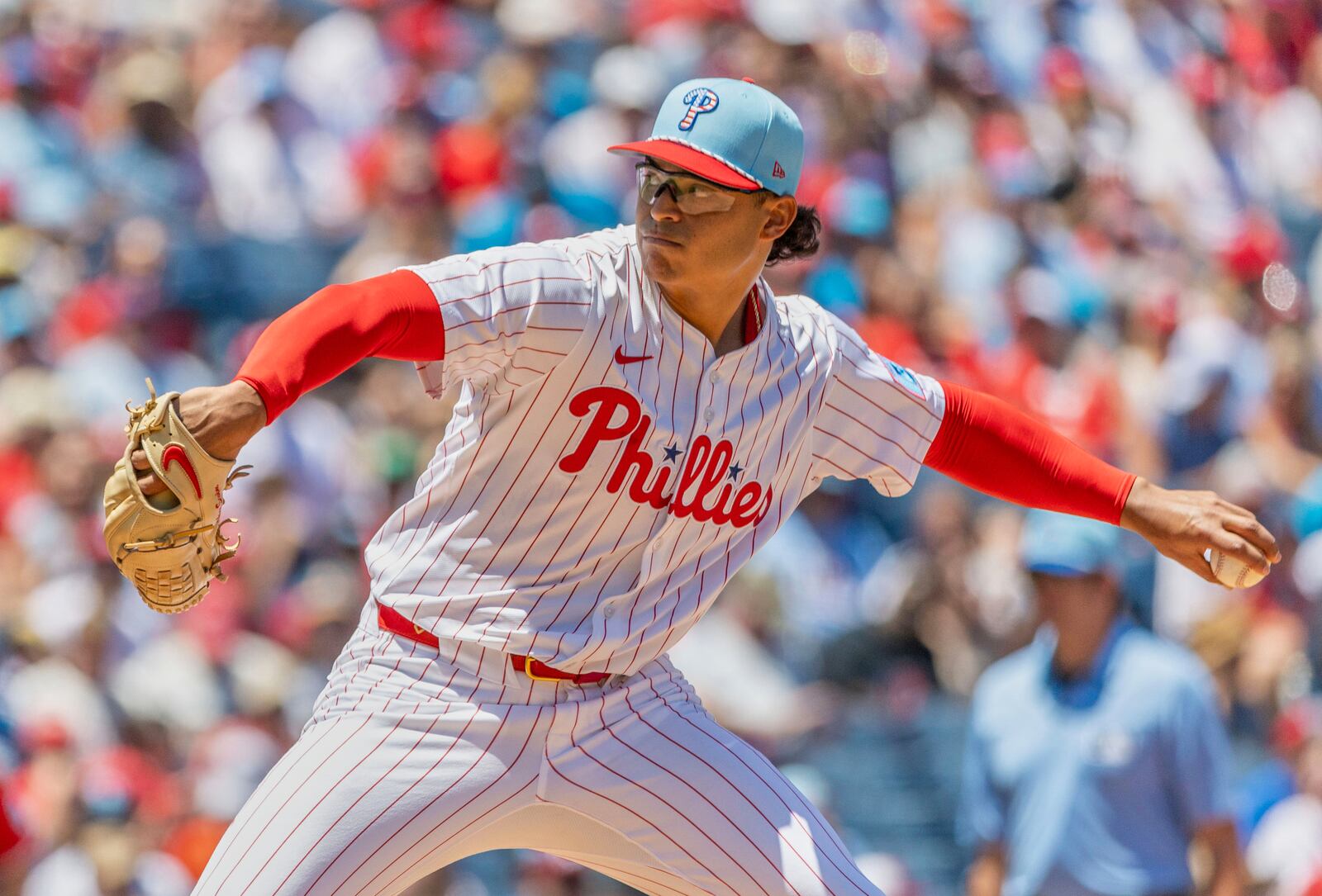 Philadelphia Phillies starting pitcher Jesus Luzardo throws in the first inning of a baseball game against the Cincinnati Reds, Friday, July 4, 2025, in Philadelphia. (AP Photo/Laurence Kesterson)