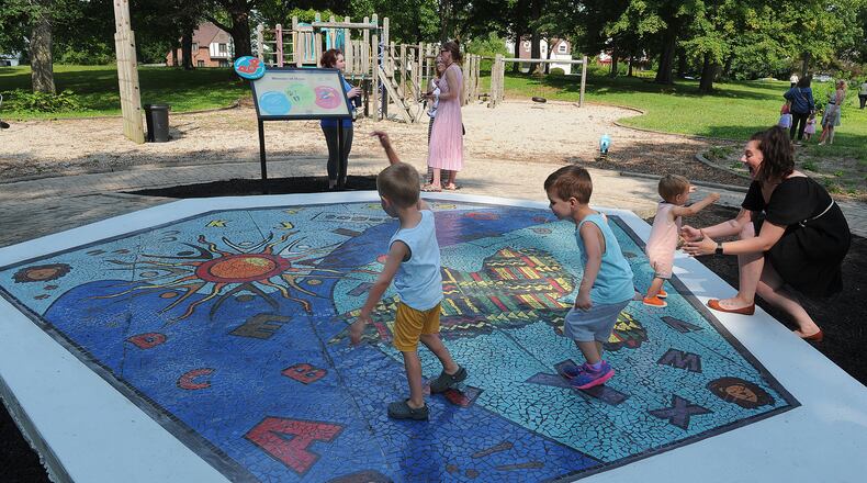 Children play at the Hope Center for Families in Dayton, July, 2021. A new assessment of the region looks at how health is affected by not just clinical care, but also neighborhood environment, preschool access, income inequality and more. MARSHALL GORBY\STAFF