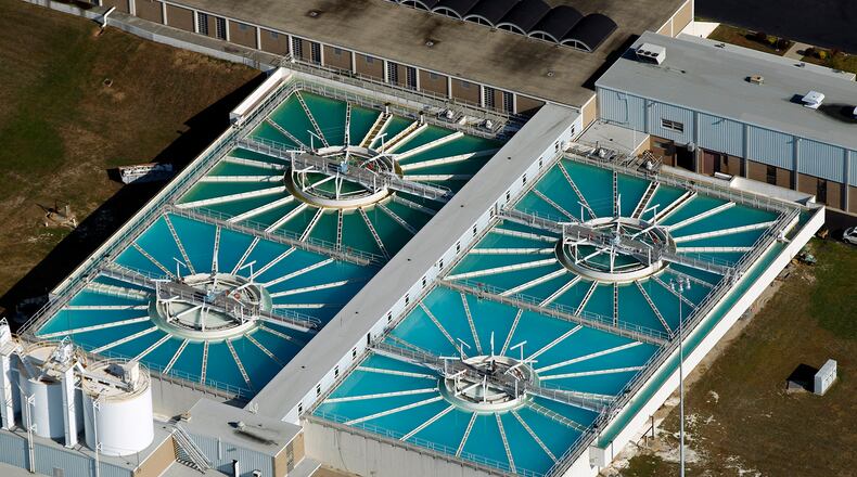 Aerial view of the Lime treatment tanks at the City of Dayton Miami Water Treatment Plant. Dayton draws water form The Great Miami River Buried Aquifer, but treats the water to a stricter surface water standard. Montgomery County purchases water from the city of Dayton. STAFF FILE