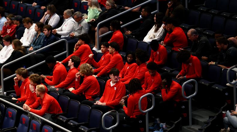 Dayton basketball players sit in the stands during The Spotlight, To Shine A Light On Mental Health" at UD Arena on Thursday, Oct. 19, 2023. David Jablonski/Staff