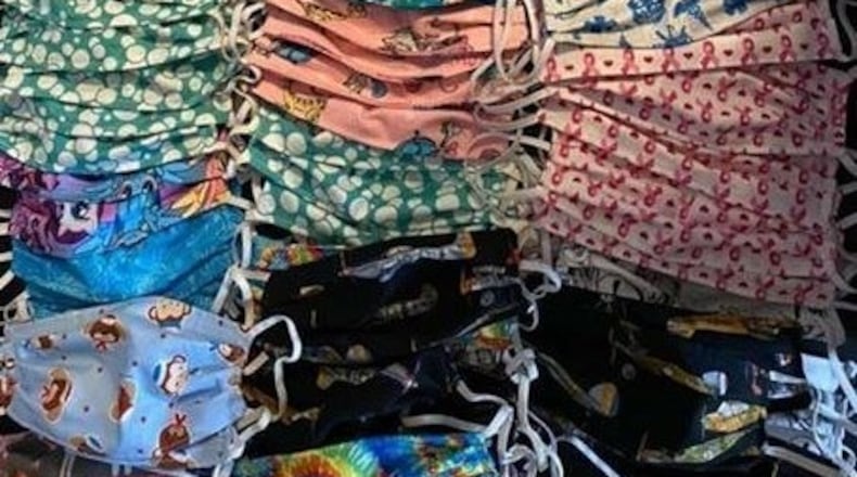 Some of the 100 masks Marcy Szynski has made for the Cancer Care Center at WPAFB.