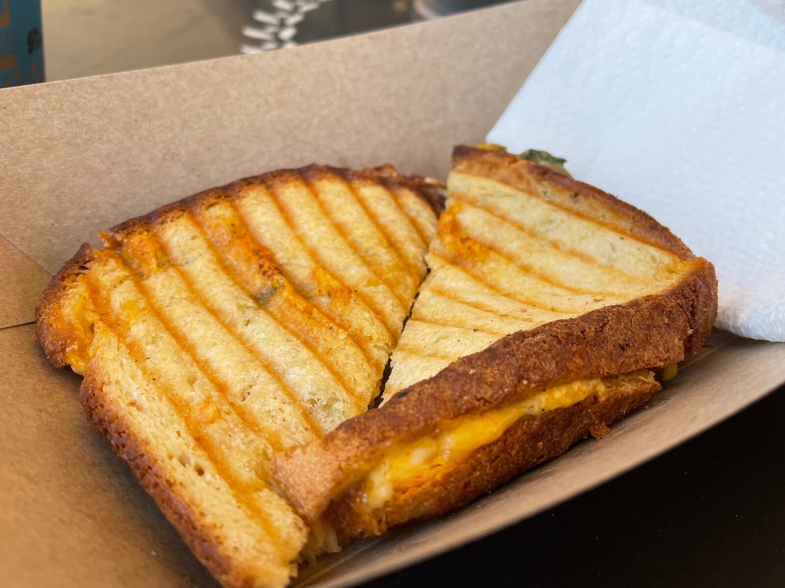 Socialite Cafe, a European-style cafe in Kettering, is open at 4011 Marshall Road. Pictured is The Jackie O' Cali Grilled Cheese. NATALIE JONES/STAFF