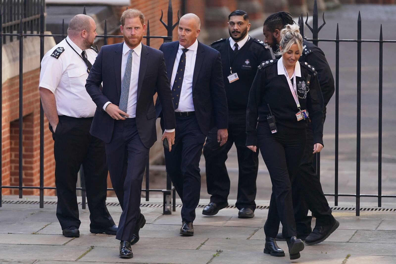 Britain's Prince Harry arrives at the High Court in London, England, Tuesday, April 8, 2025. (AP Photo/Alberto Pezzali)