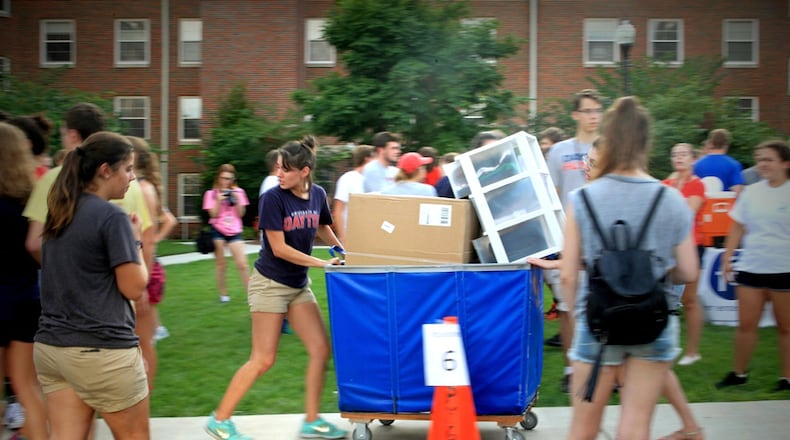 Universiity of Dayton students move into Founders Hall for the start of the new academic year in 2016. JIM NOELKER / STAFF