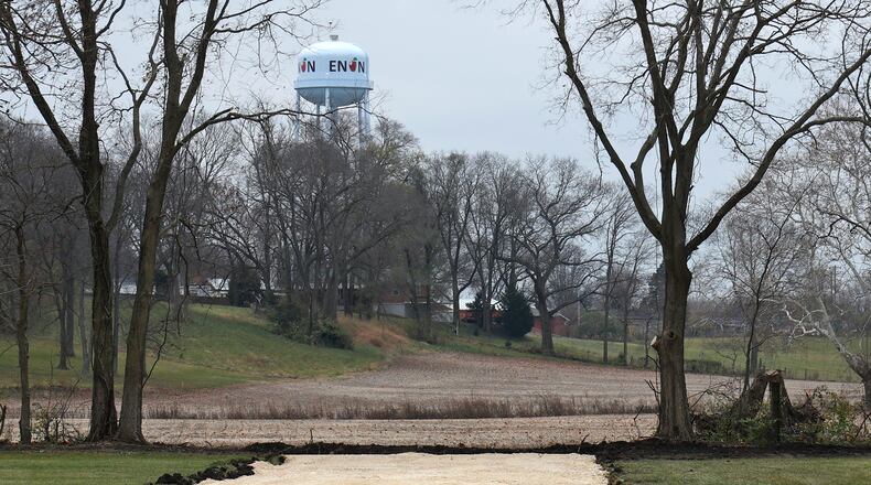 A gravel road has recently been created to provide access through the Enon Community Park to the field where the proposed sports park will be located. BILL LACKEY/STAFF