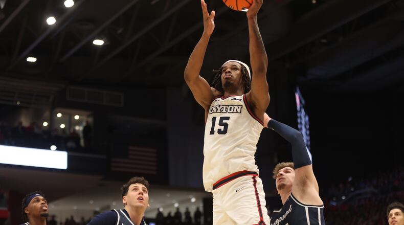Dayton's DaRon Holmes II scores against Longwood on Saturday, Dec. 30, 2023, at UD Arena. David Jablonski/Staff