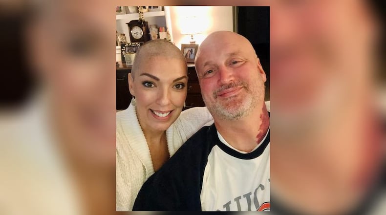 Tiffany Thompson (left) after completing her first round of chemotherapy in 2020. Her husband Tom is on the right. CONTRIBUTED