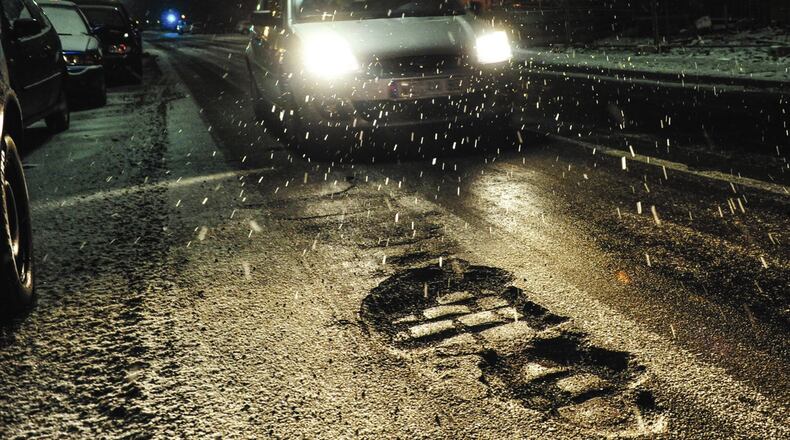 After winter snow, clear your vehicle s front air intake to ensure that the engine runs efficiently. Photo by Metro Creative Graphics