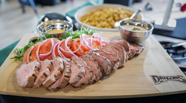 The Dayton Dragons displayed food offerings available to fans at Day-Air Ballpark this spring, including a meat tray. BRYANT BILLING / STAFF