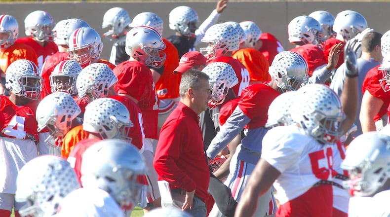 Urban Meyer watches Ohio State practice on Dec. 27, 2016.