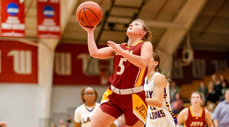 Northeastern High School junior Zoe Tuttle drives to the basket during their game against Emmanuel Christian on Thursday, Dec. 28, 2023 at the Clark County Basketball Showcase at Pam Evans Smith Arena in Springfield. Michael Cooper/CONTRIBUTED
