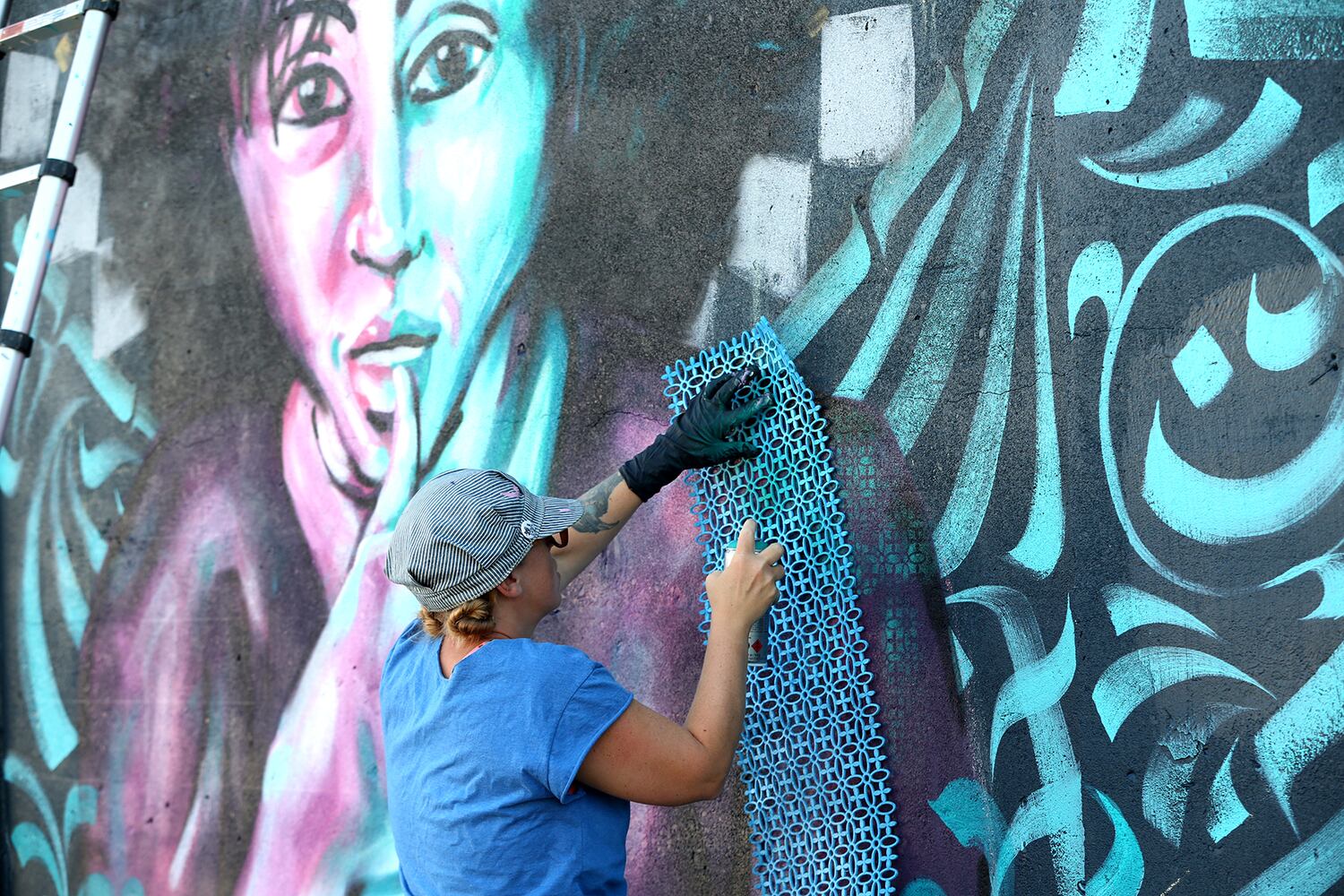 PHOTOS: New Dayton mural created in calligraffiti style with more than 20 colors